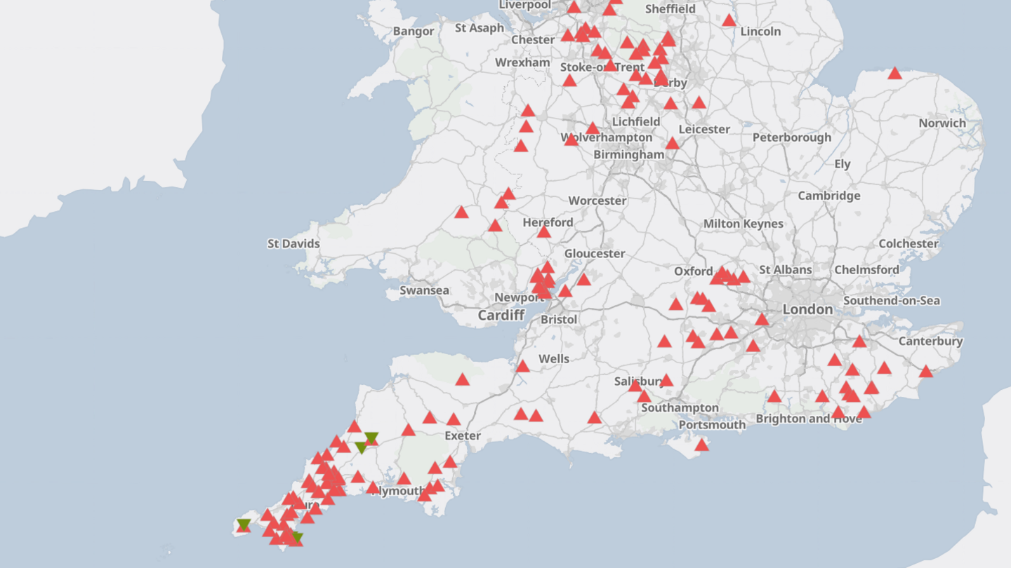A graphic of a map showing England up to Liverpool and Sheffield with red and green triangles showing cases of bluetongue. The only four green triangles which indicate BTV-8 are all are in Cornwall. There is marked cluster of red triangles indicating BTV-3 in Cornwall. Derby, Stoke-on-Trent and Chester have a smaller cluster and there are several cases clustered near Newport and Oxford and spread across East Sussex.
