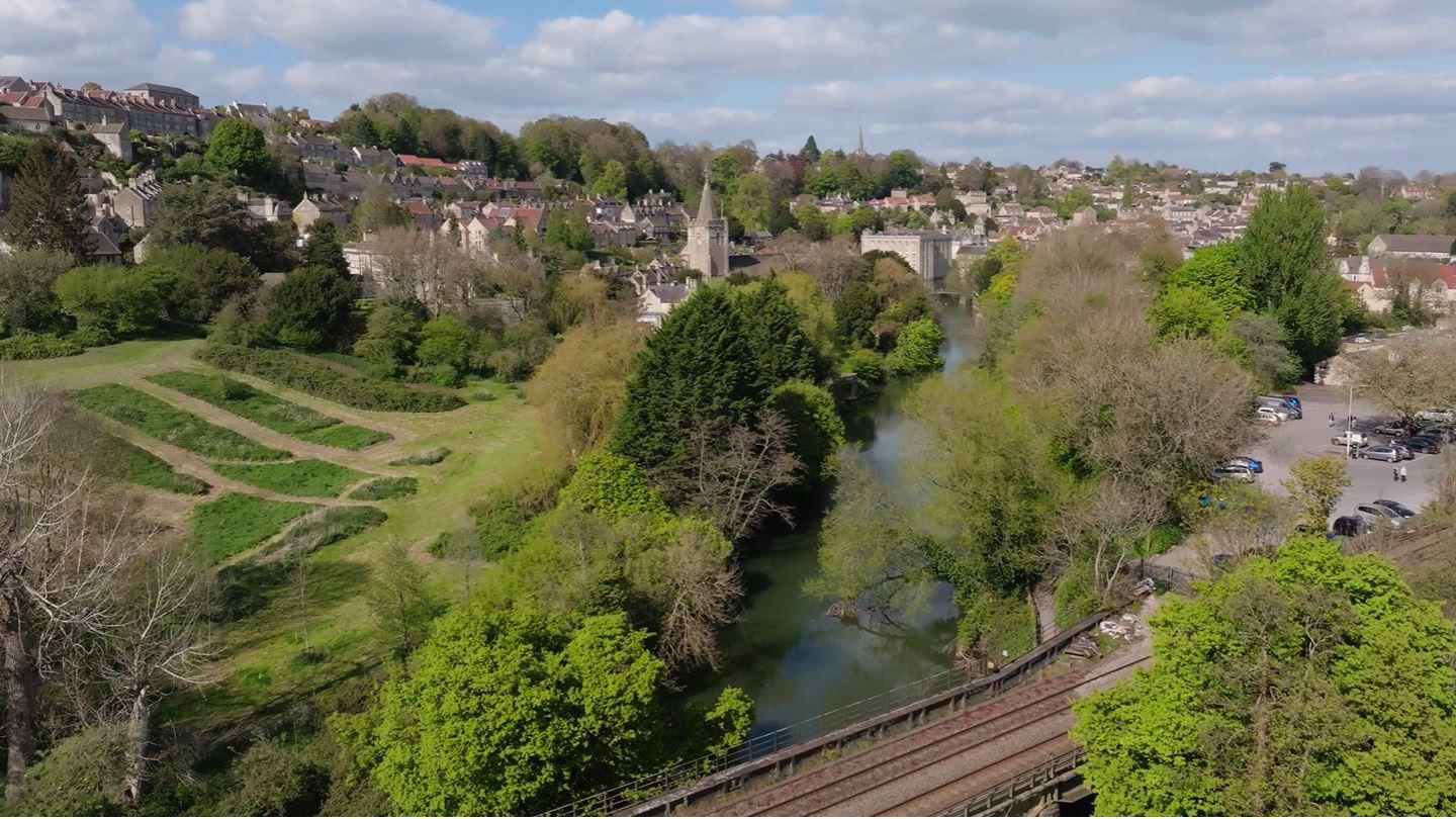 An aerial view of the old golf course with Bradford-on-Avon visible in the background