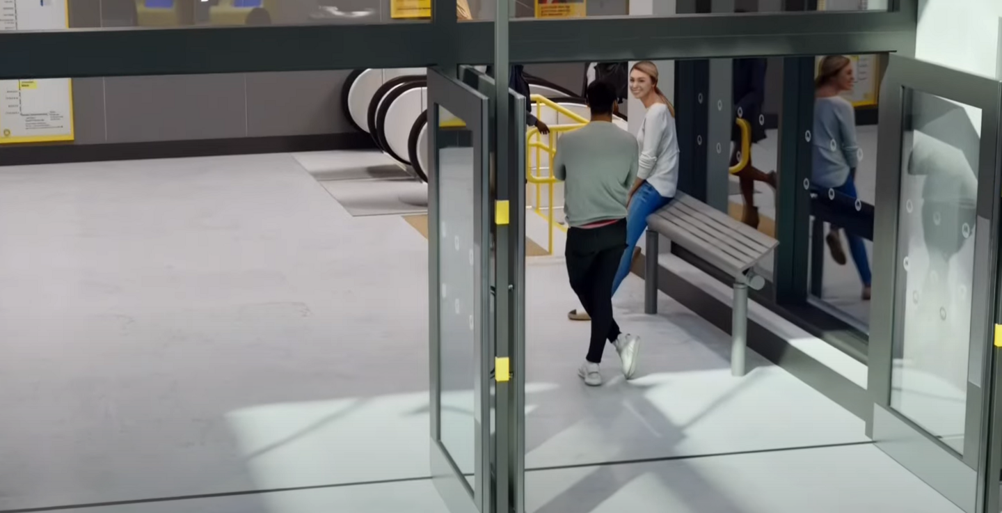 A CGI image of a man and a woman talking near to the entrance of the planned Baltic station in Liverpool