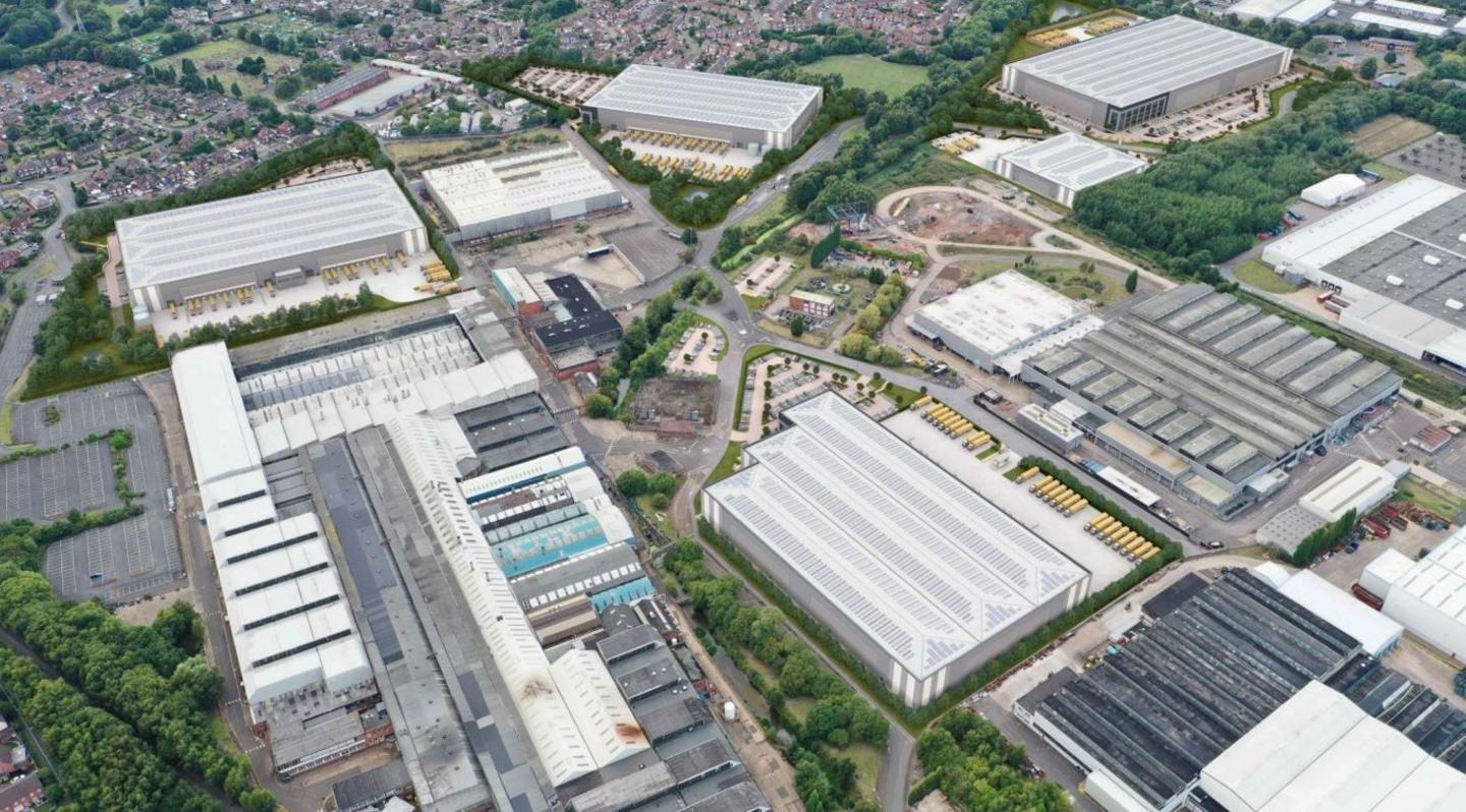 A mocked up aerial view of industrial units interspersed with landscaping, access roads and car parking.