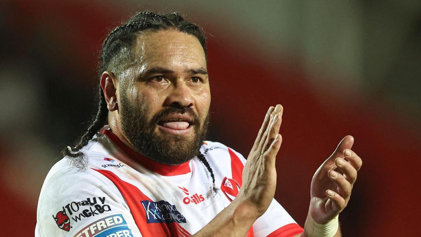 Konrad Hurrell applauds the St Helens fans