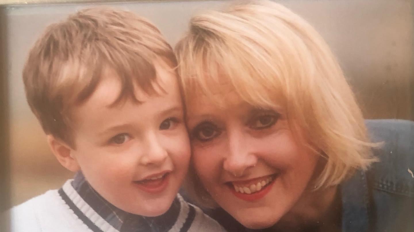 A childhood shot of Sam and his mum