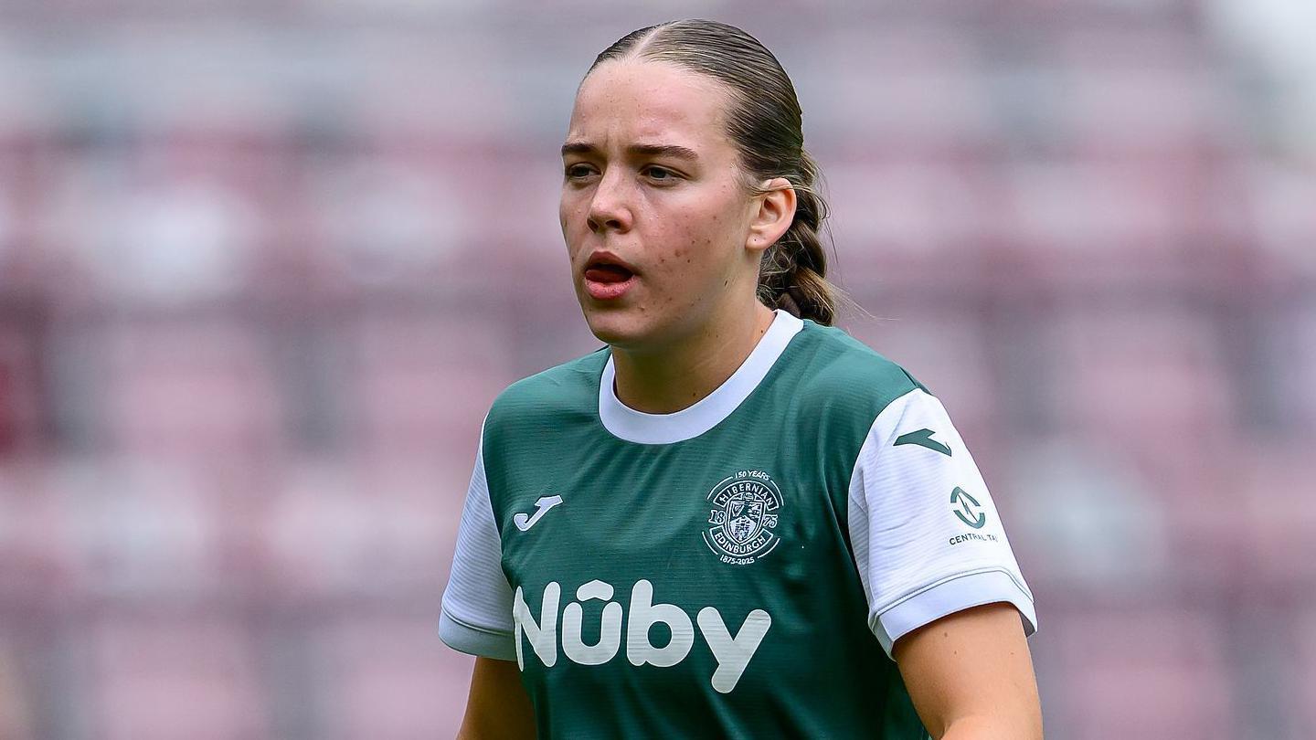 Rosie Livingstone wearing a Hibernian shirt