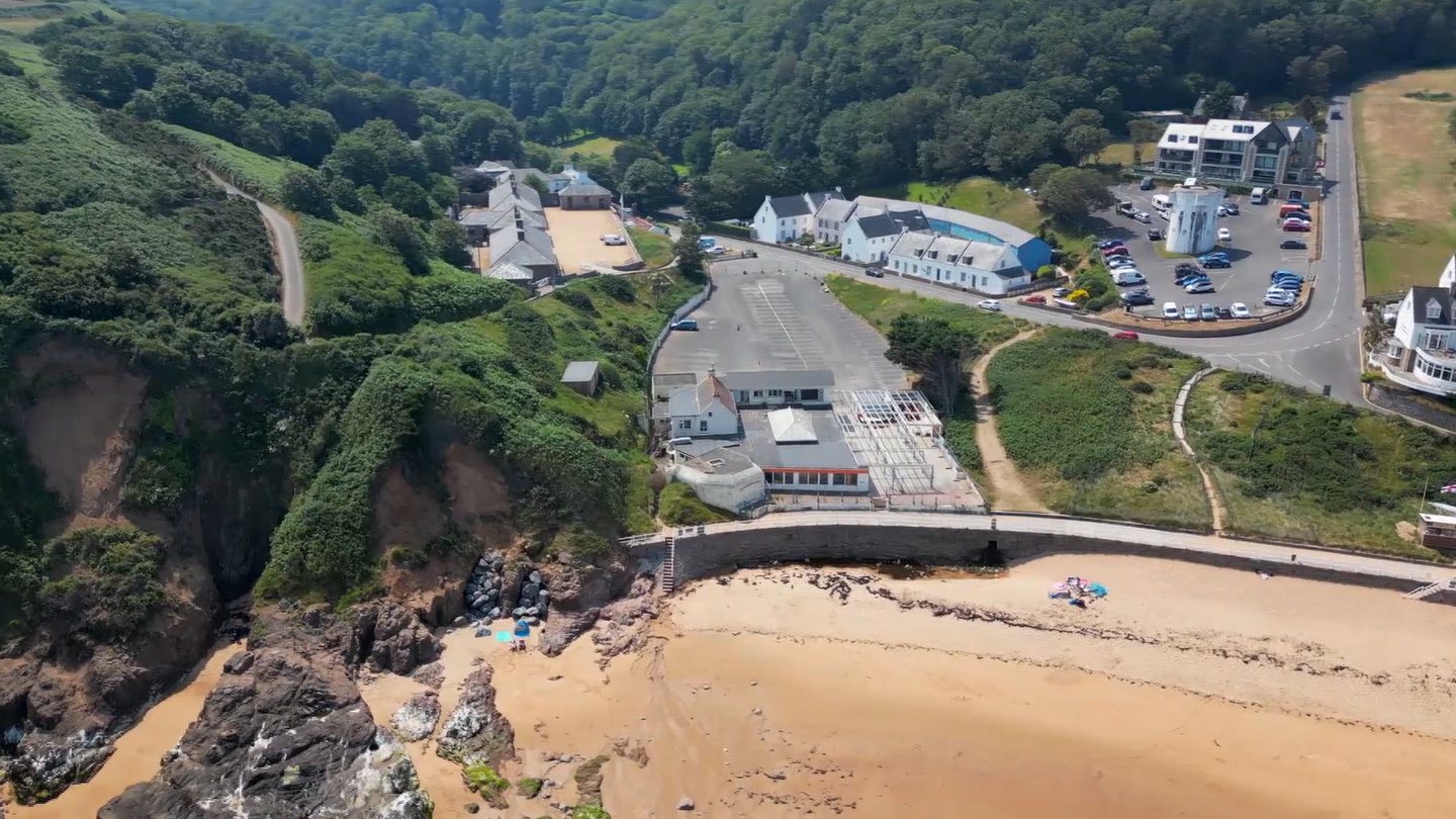 Sandy beach and carpark