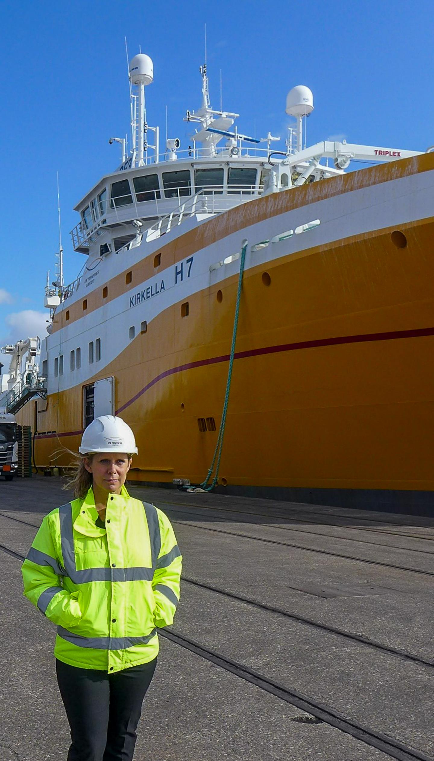 Jane Sandell, CEO of UK Fisheries, in front of the last vessel in the company's fleet