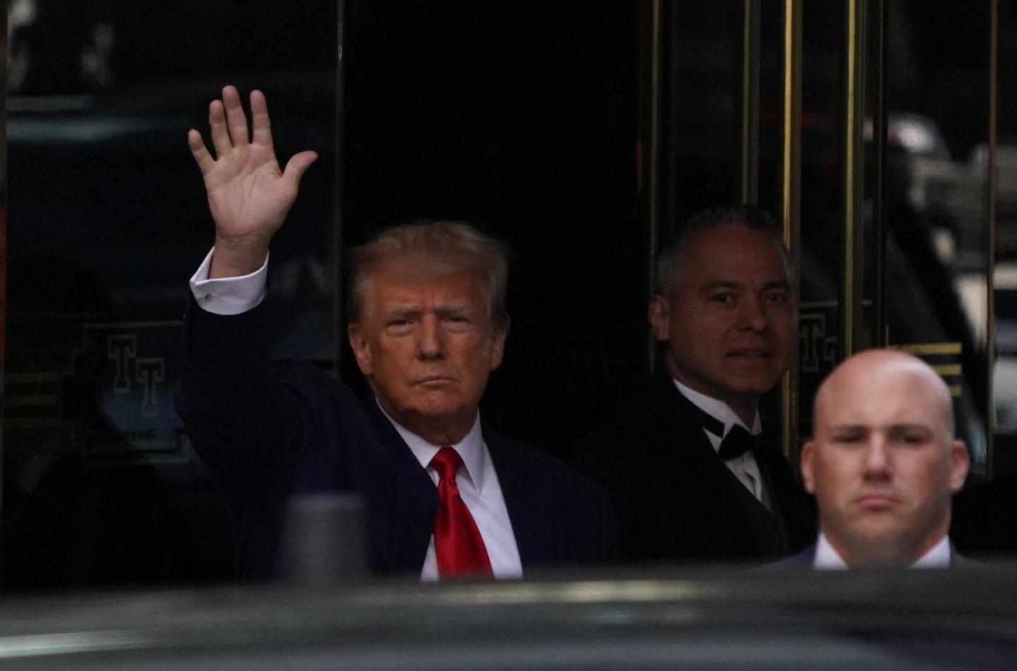 Donald Trump leaves Trump Tower