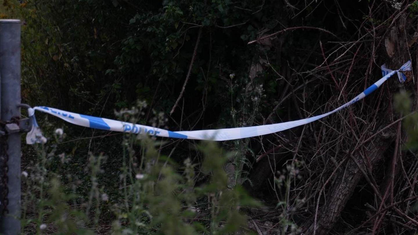 Police cordon and car in the Newmill Lane area of Brantham, Suffolk.