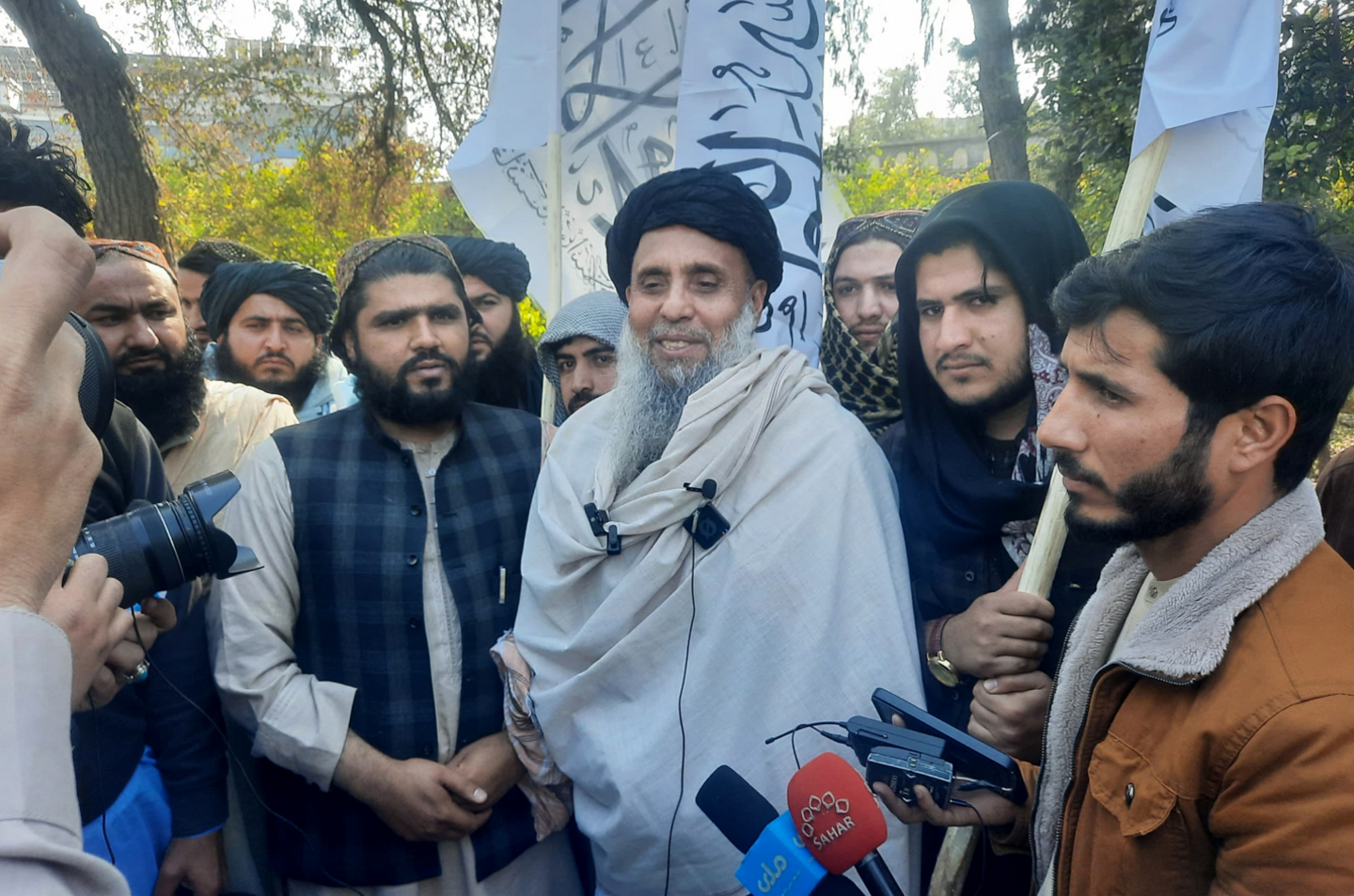  Khan Mohammad (C) who was imprisoned in America, speaks to the media as he arrived in Jalalabad on January 21, 2025, after he was released in exchange for American citizens.