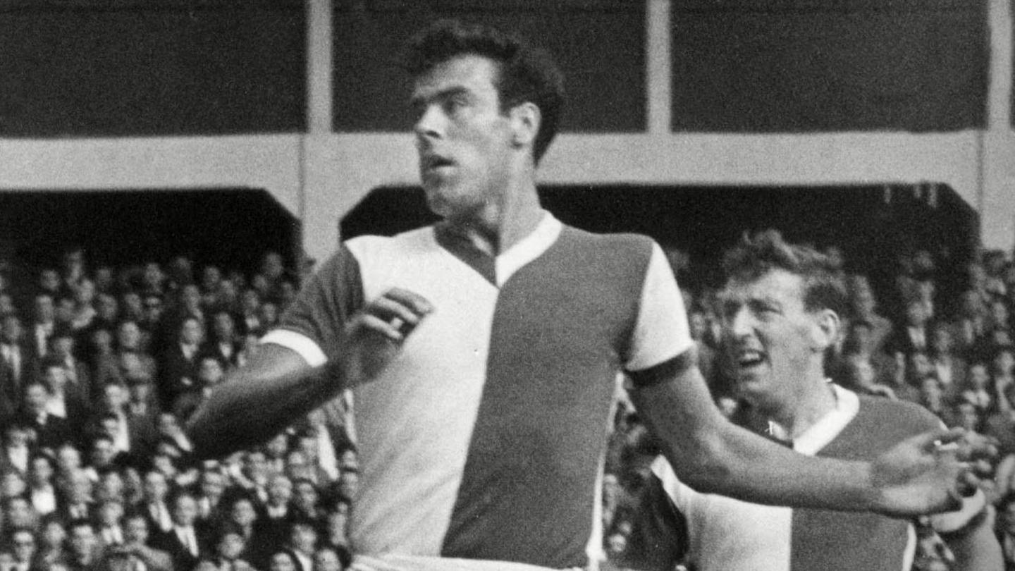 Mike England in action for Blackburn Rovers