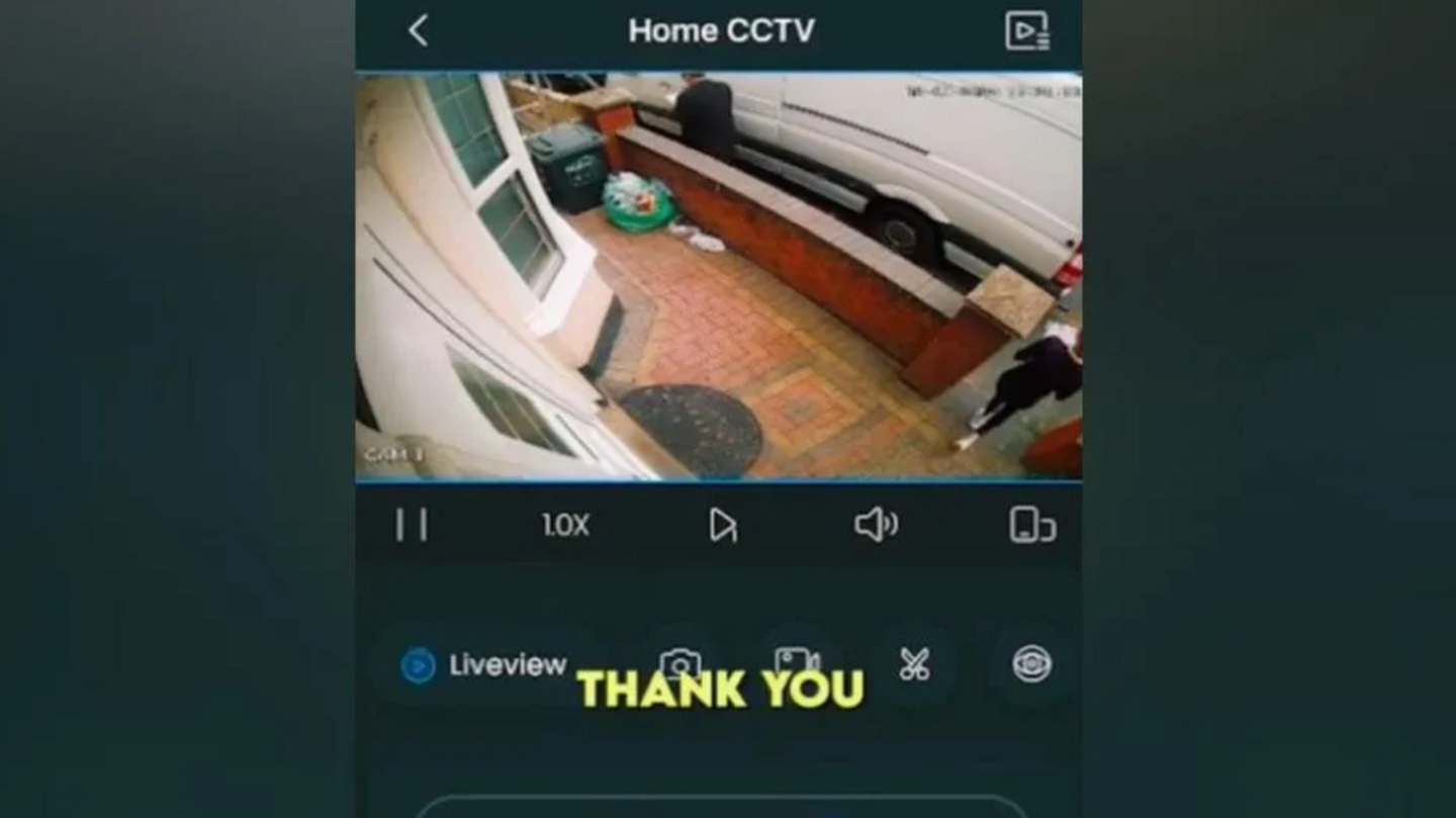 A screenshot of the doctored doorbell footage, with a yellow caption saying 'thank you' over it