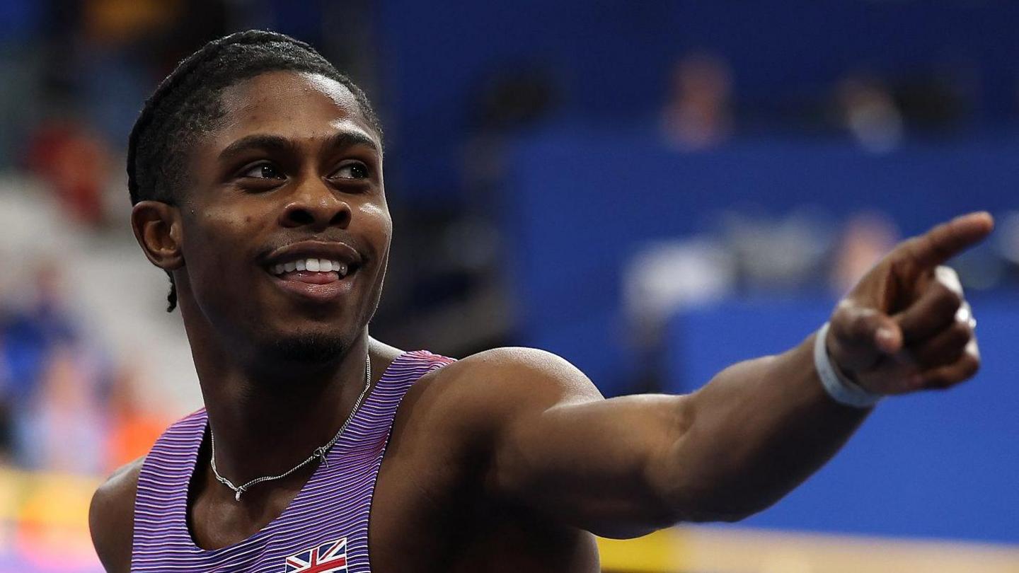 Great Britain's Jeremiah Azu celebrates his European indoor 60m gold