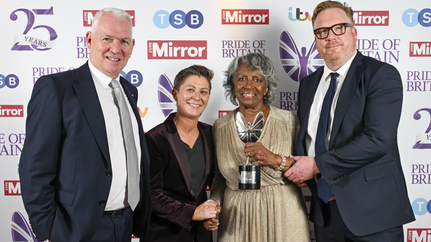 Agness Nisbett (second right) at the Pride of Britain awards holding her trophy with three others