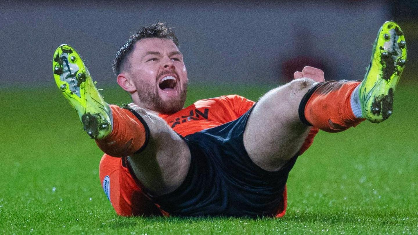 Dundee United's Glenn Middleton celebrates scoring to make it 1-1 during a William Hill Premiership match between St Johnstone and Dundee United at McDiarmid Park,