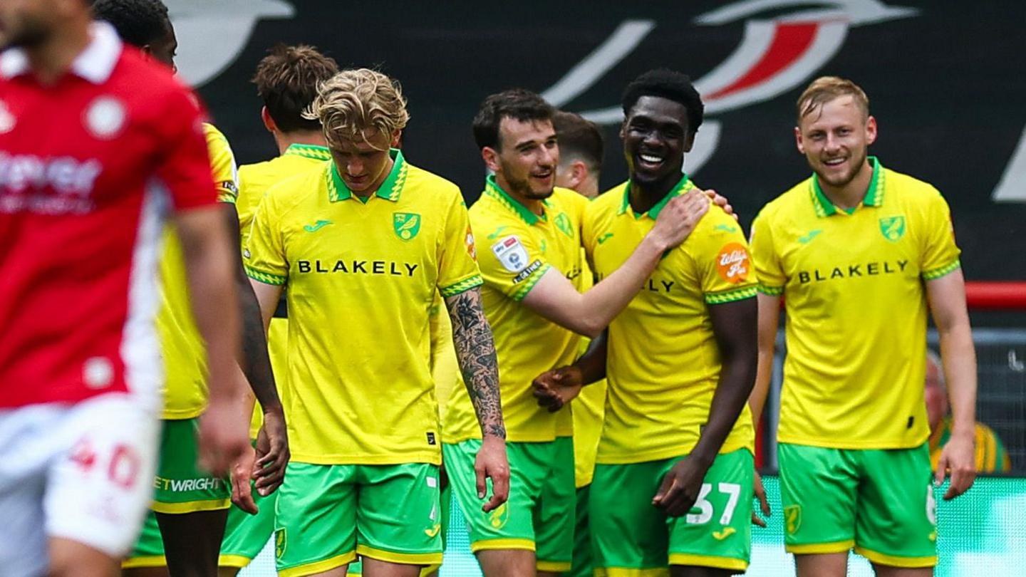 Mohamed Toure celebrating.