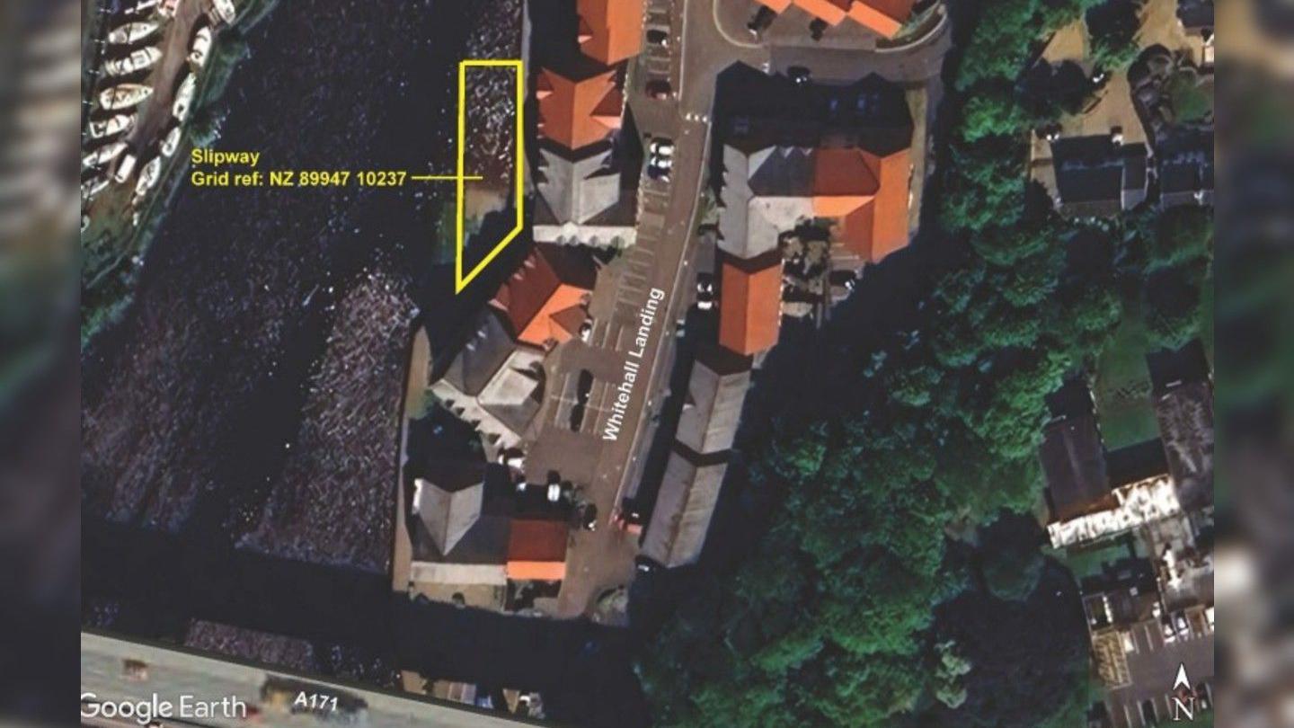 Map view of the A171 in Whitby and the river Esk, with the slipway outlined in yellow next to the Whitehall Landing apartment buildings. 