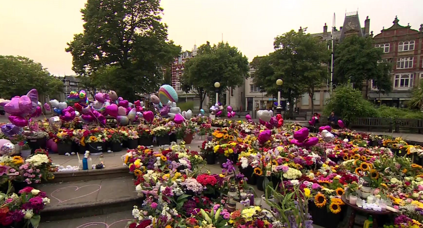 The square outside the Atkinson in Southport is a sea of flowers and teddy bears in the wake of the Southport knife attack