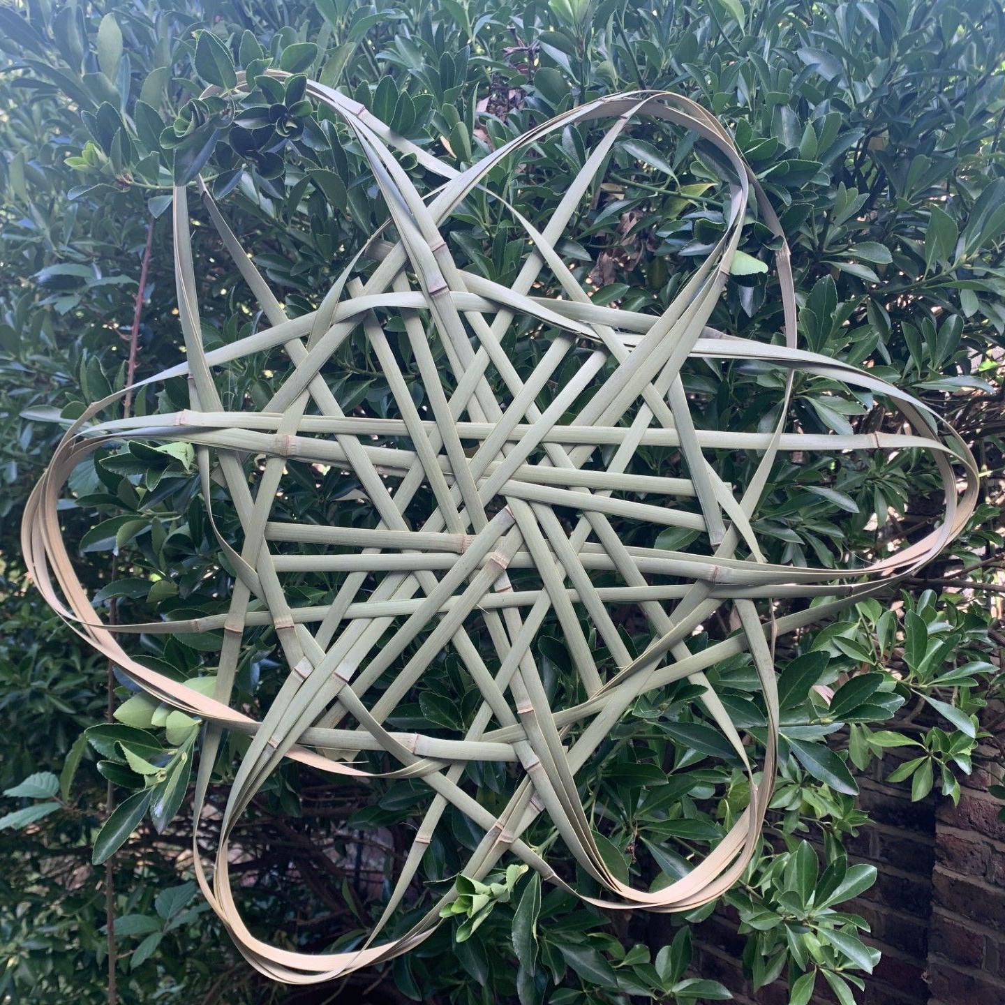 A 1m-high piece of six-pointed star-shaped art made from woven bamboo
