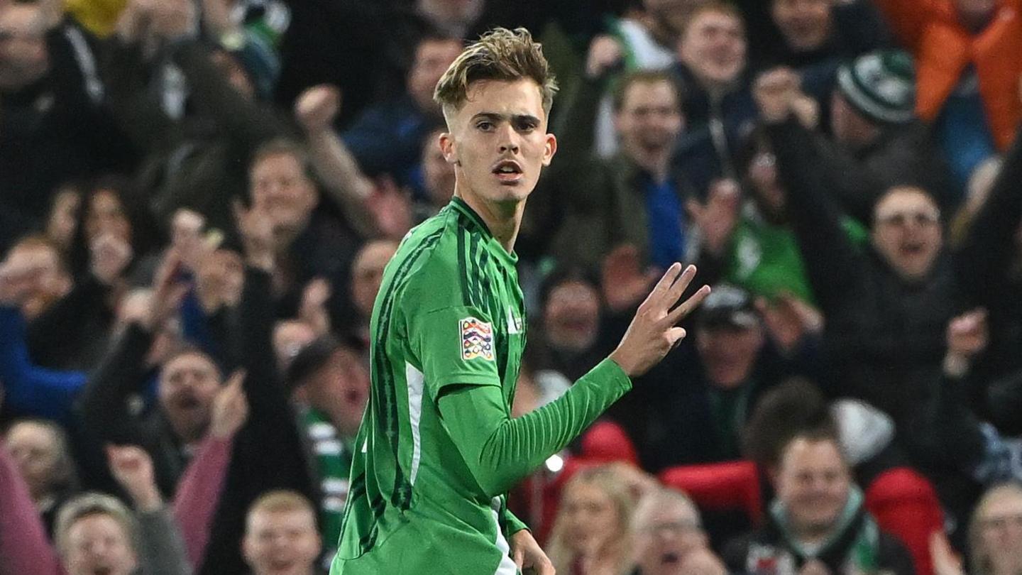 Isaac Price celebrates his hat-trick in a 5-0 thrashing of Bulgaria at Windsor Park 