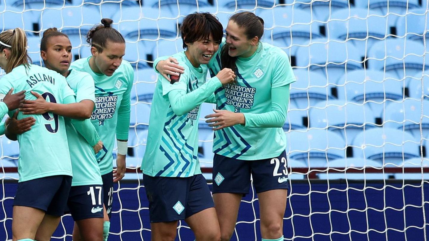 Saki Kumagai celebrates her second goal with her London City team-mates