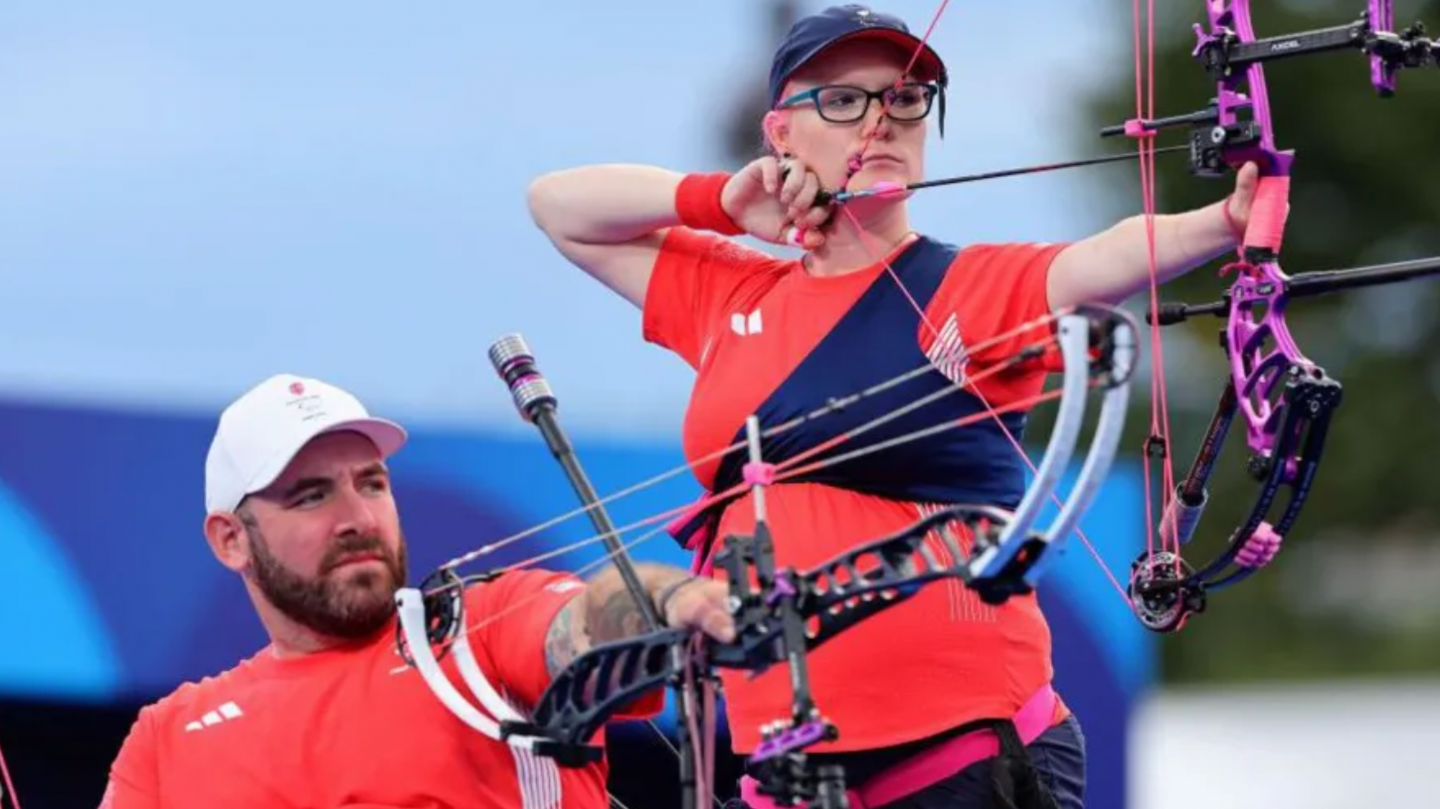 Para-archers Nathan Macqueen and Jodie Grinham competing as a team in the in the finals