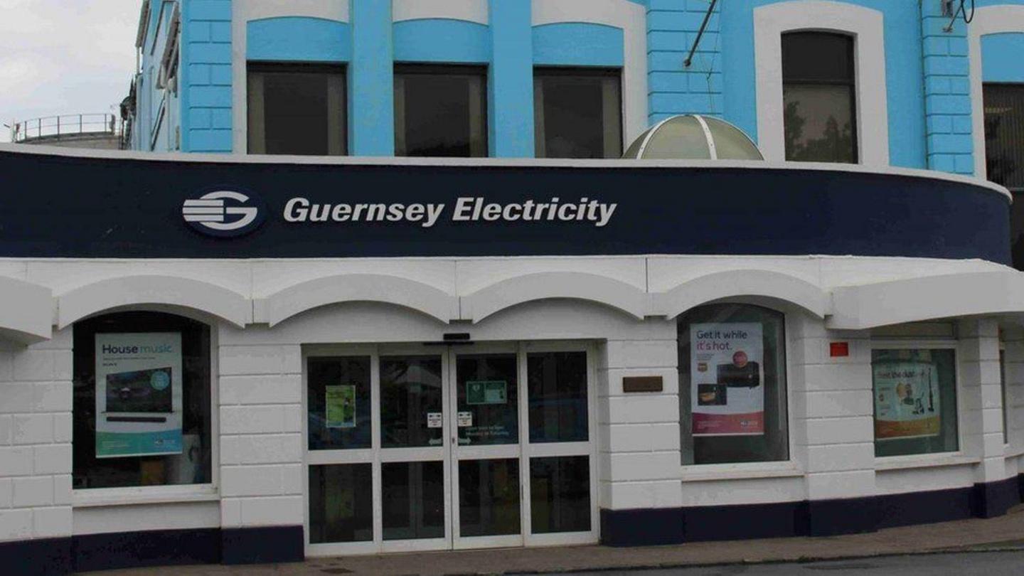 Guernsey Electricity building with posters in the window and double doors at the front