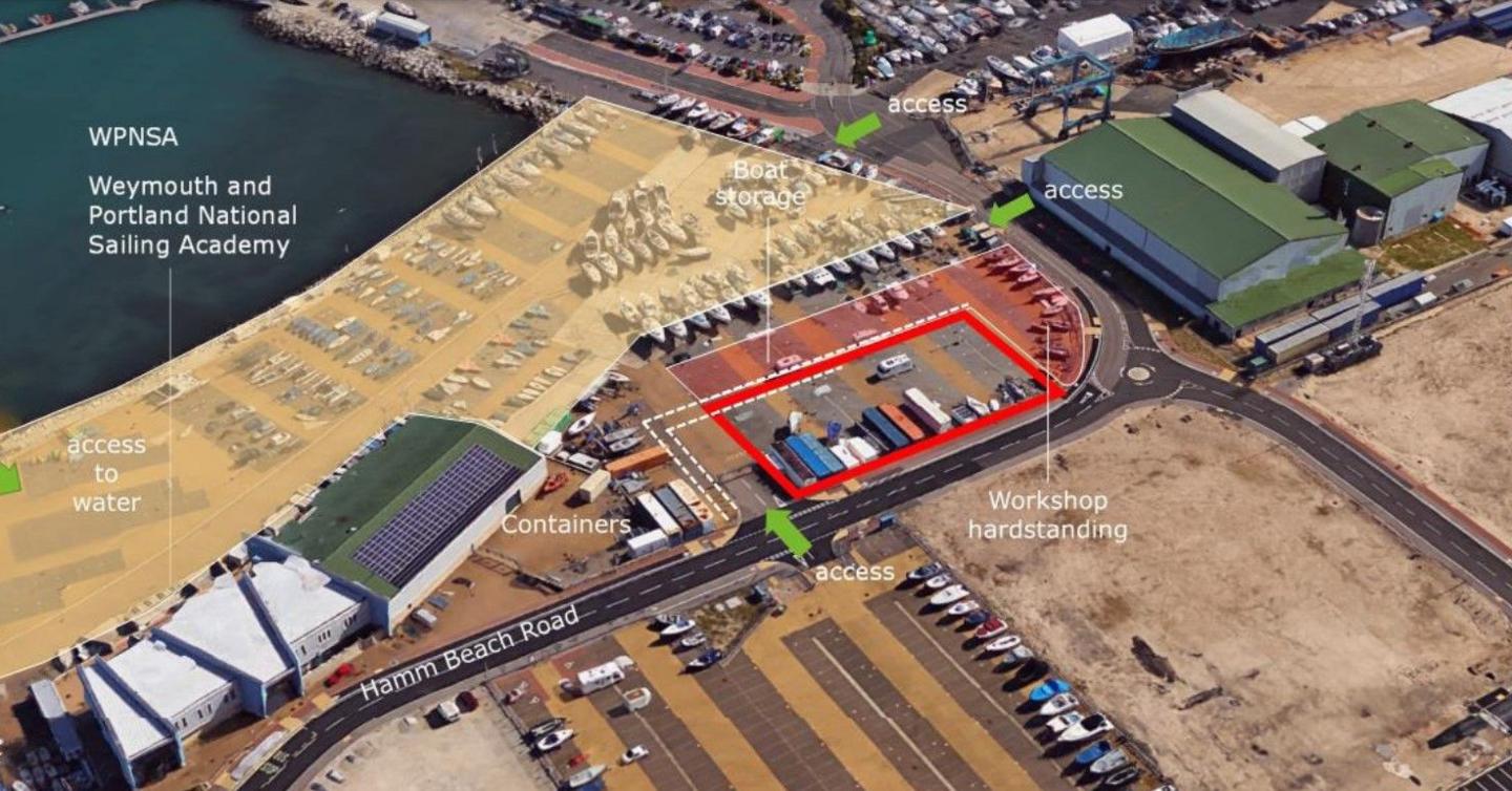 Aerial view of the area where the plans for a new sailing centre would be marked in red.