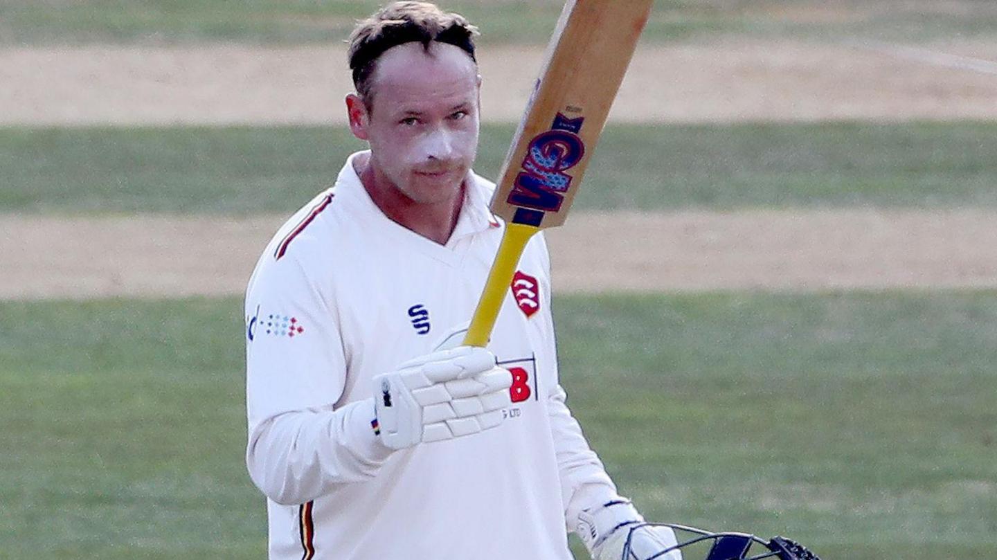 Tom Westley celebrates scoring a century