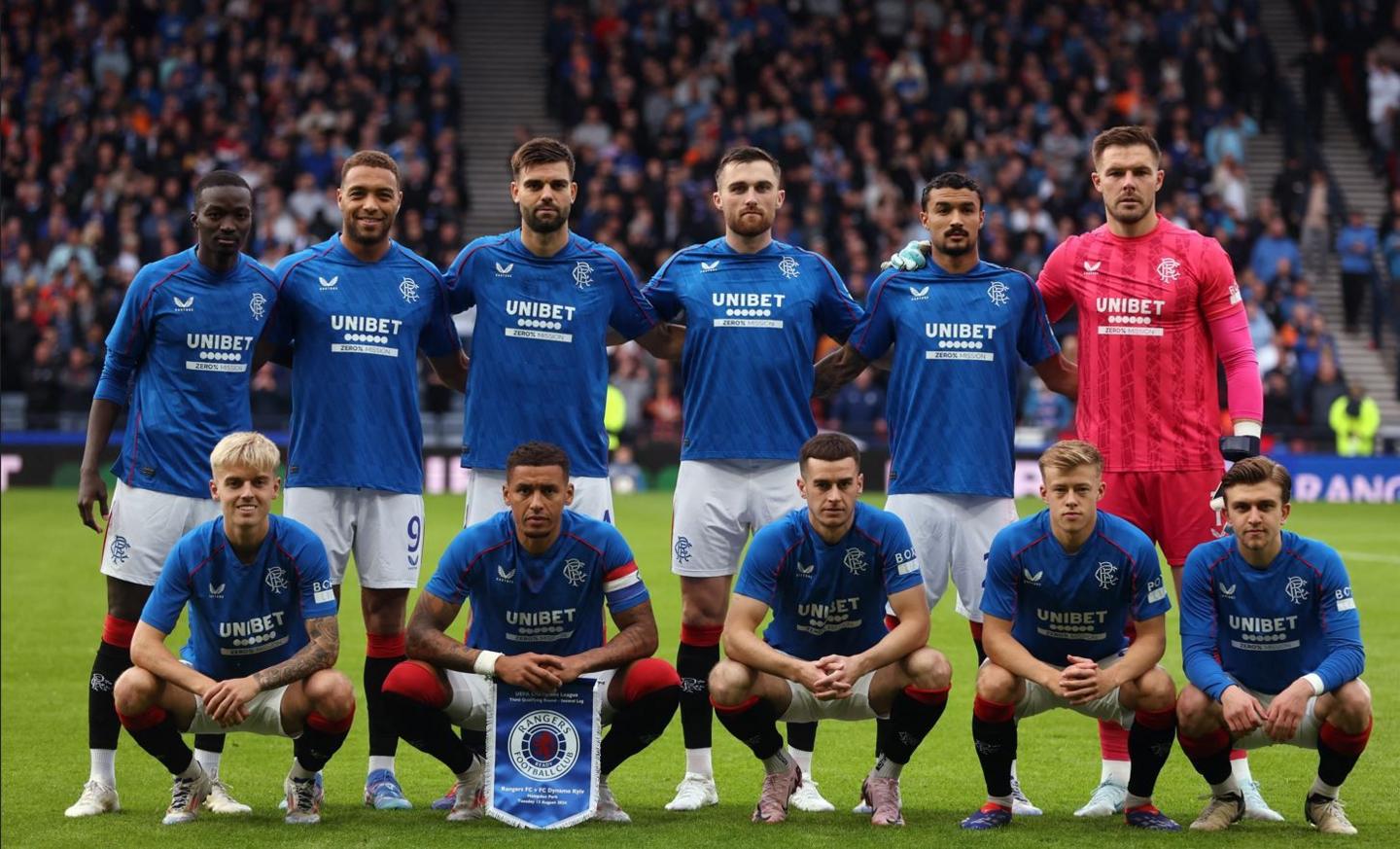 Rangers players pose for a team group photo before the match 