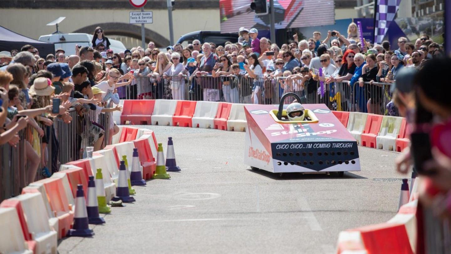 A go-kart racing along a makeshift race track