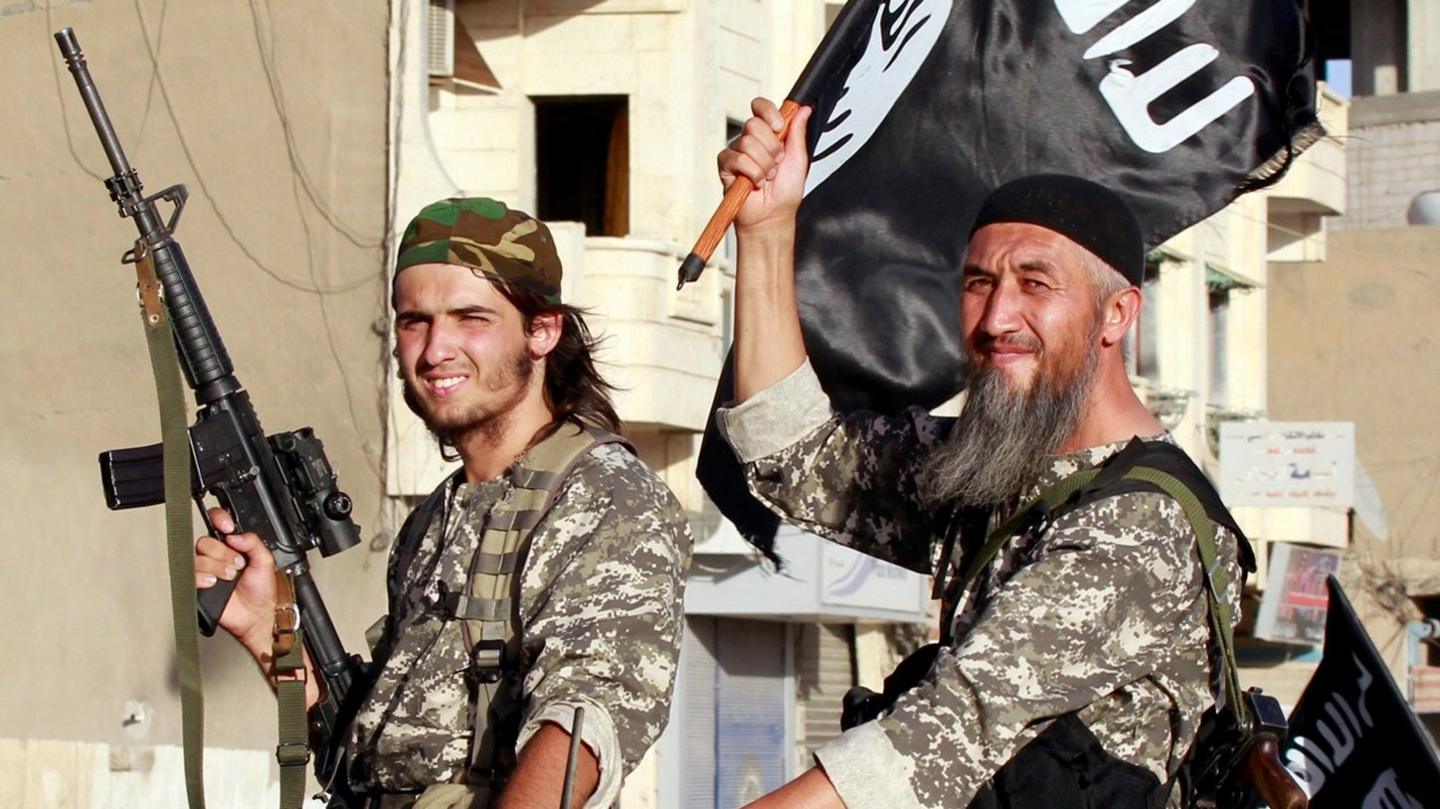 Islamic State fighters parade in Raqqa, Syria (30 June 2014)