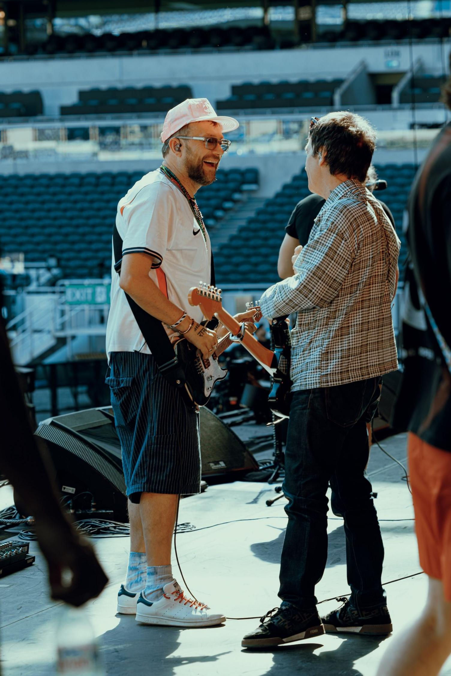 Damon Albarn chats on stage while rehearsing for Gorillaz' stage show