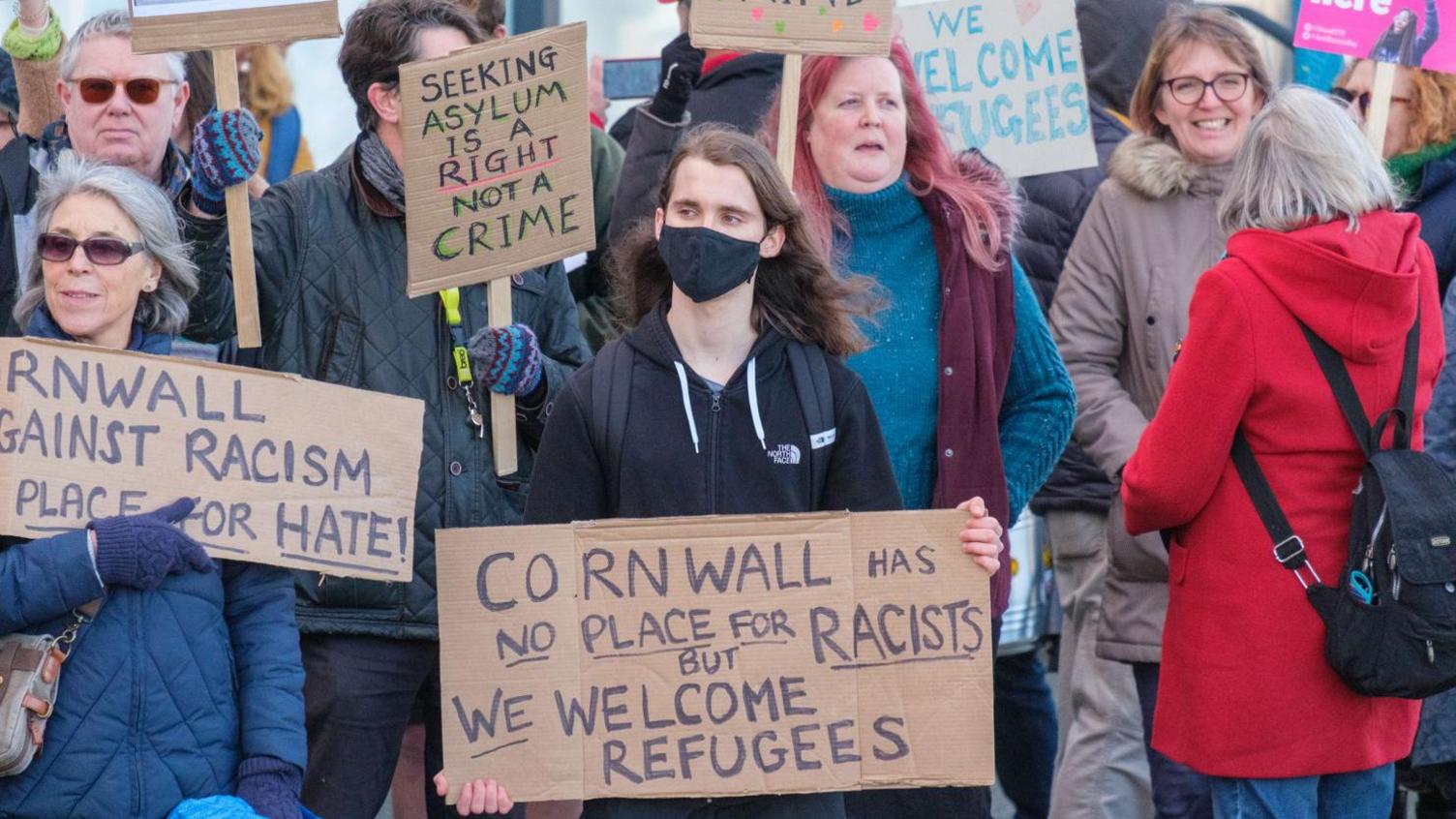 Campaigners for asylum seekers at a protest in Cornwall in February