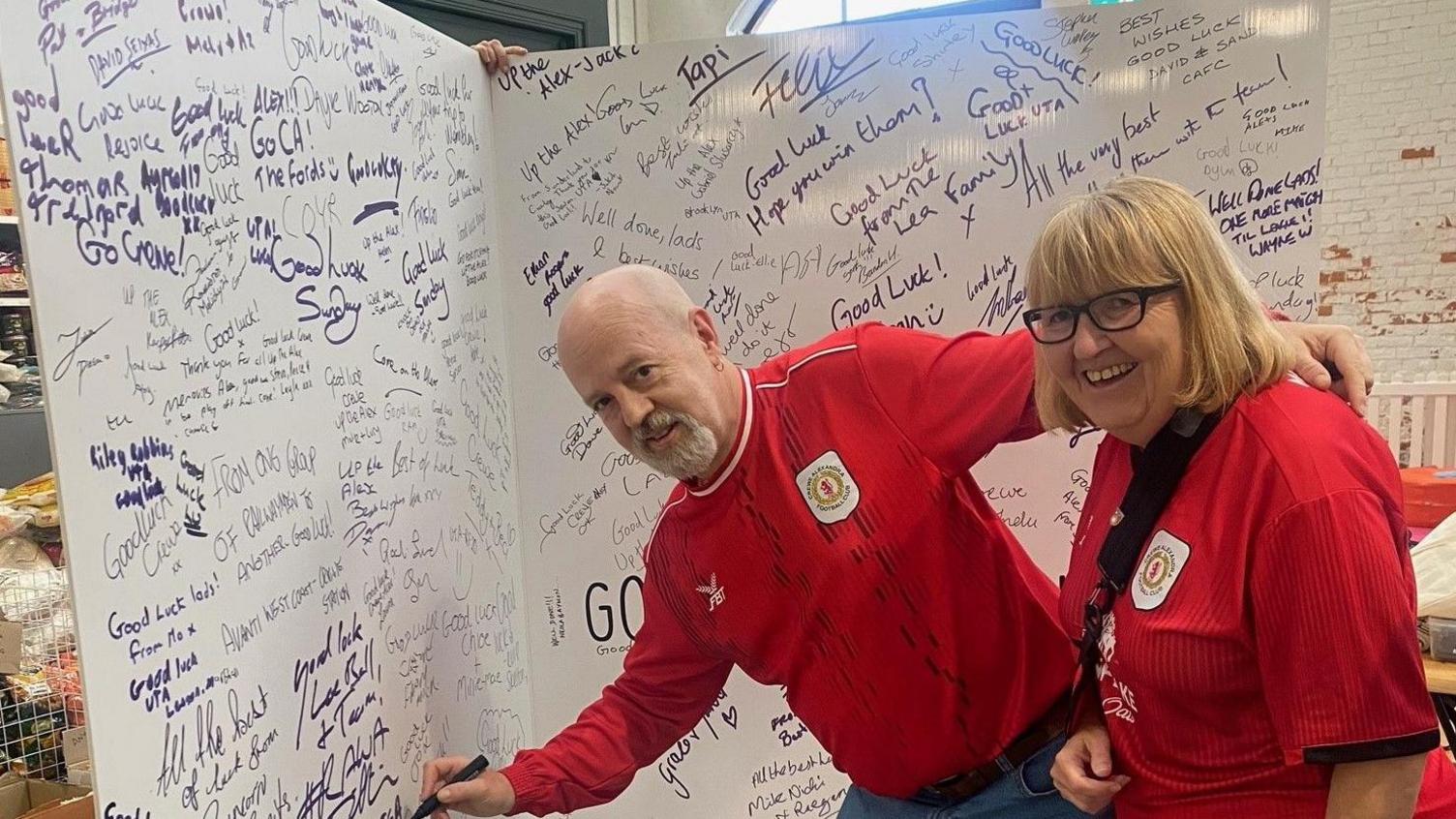 Crewe fans sign giant good luck card