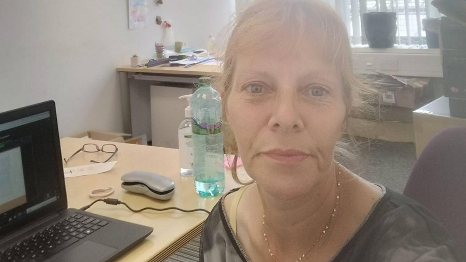 Frédérique Poujades in her office at the University of Nottingham, taking a selfie.