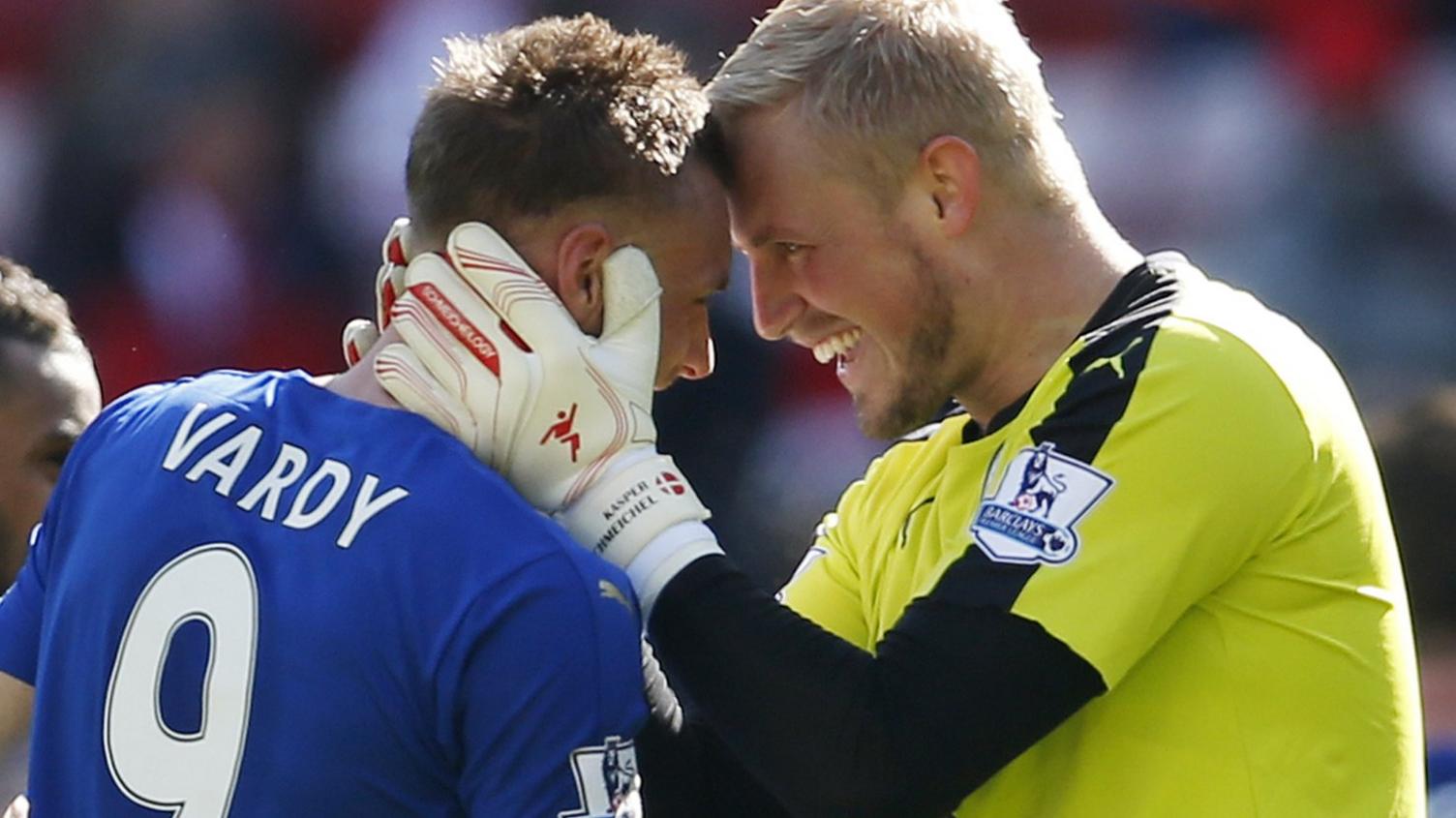 Jamie Vardy and Kasper Schmeichel celebrate Leicester's win