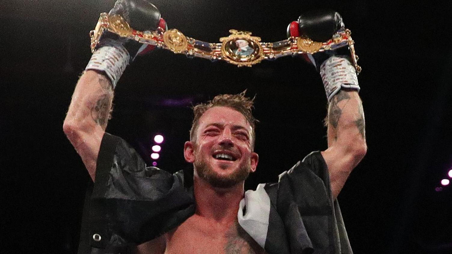 Brad Pauls lifts the British title belt