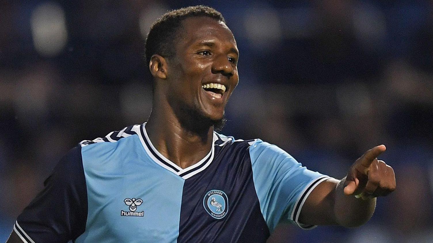 Richard Kone celebrates a goal for Wycombe Wanderers