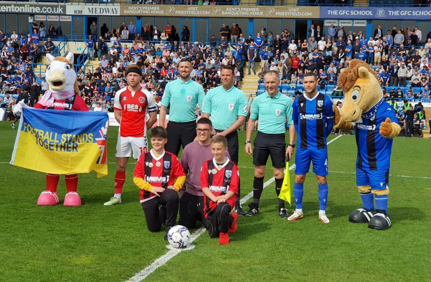 Daniel and Gillingham players at Priestfield