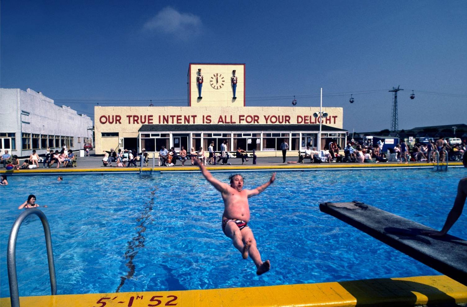 A man falls in the swimming pool