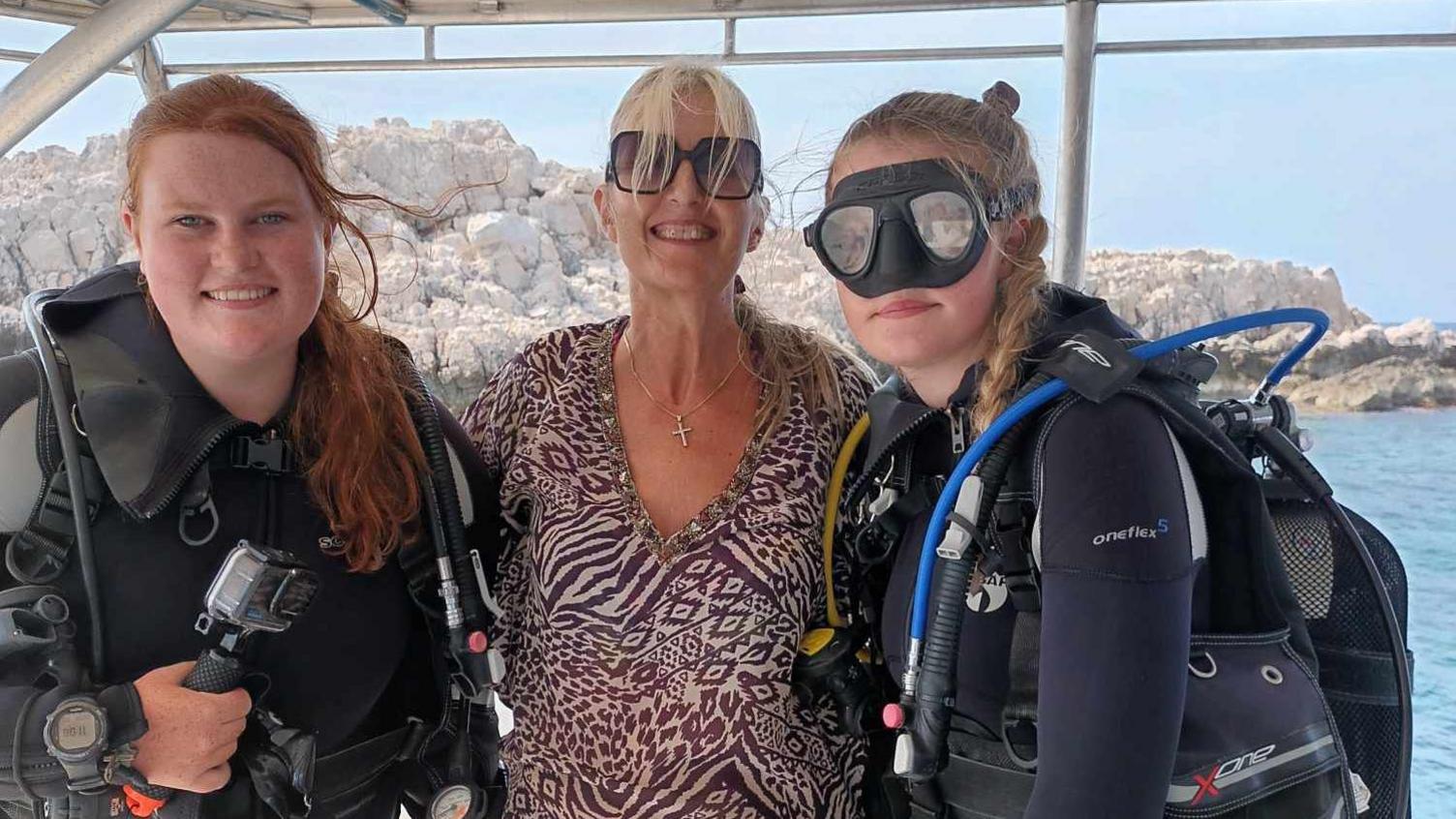 Tallie (left) pictured with her mum and younger sister