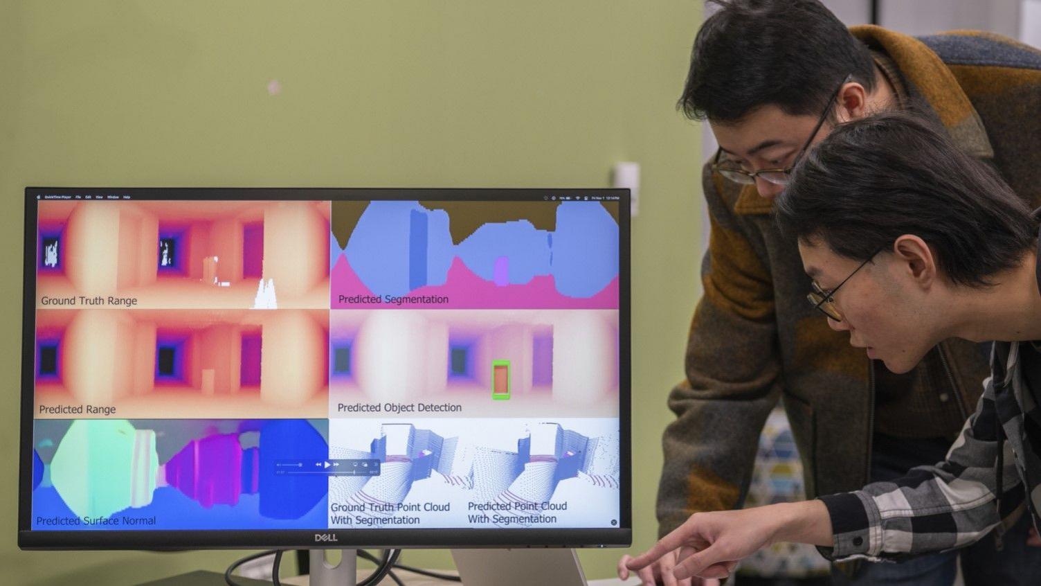 A screen shows 3D images of a room created by the radio vision system.