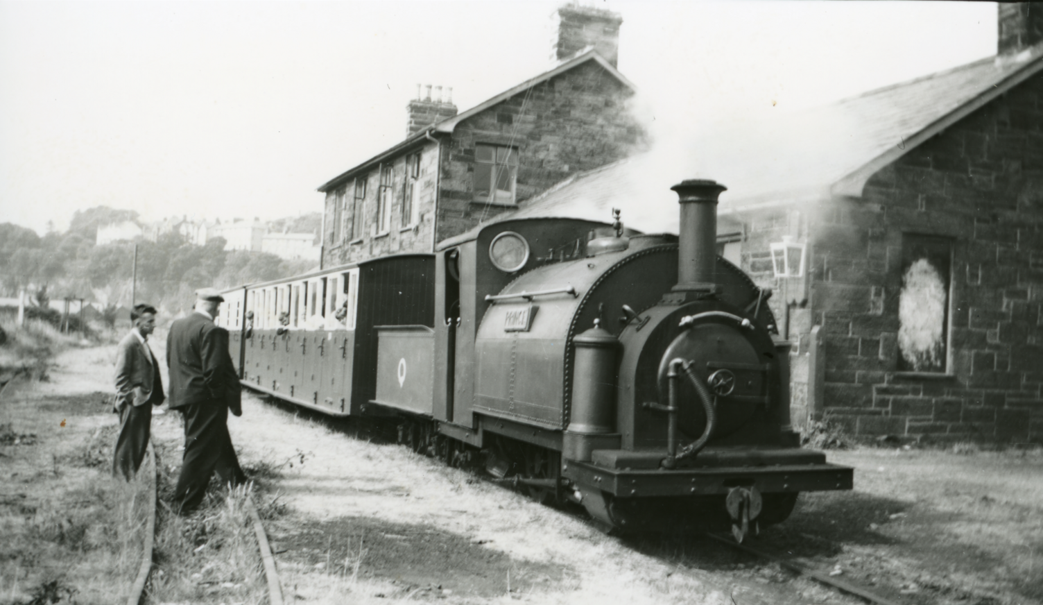 A vintage black and white photo of the Prince locomotive in steam