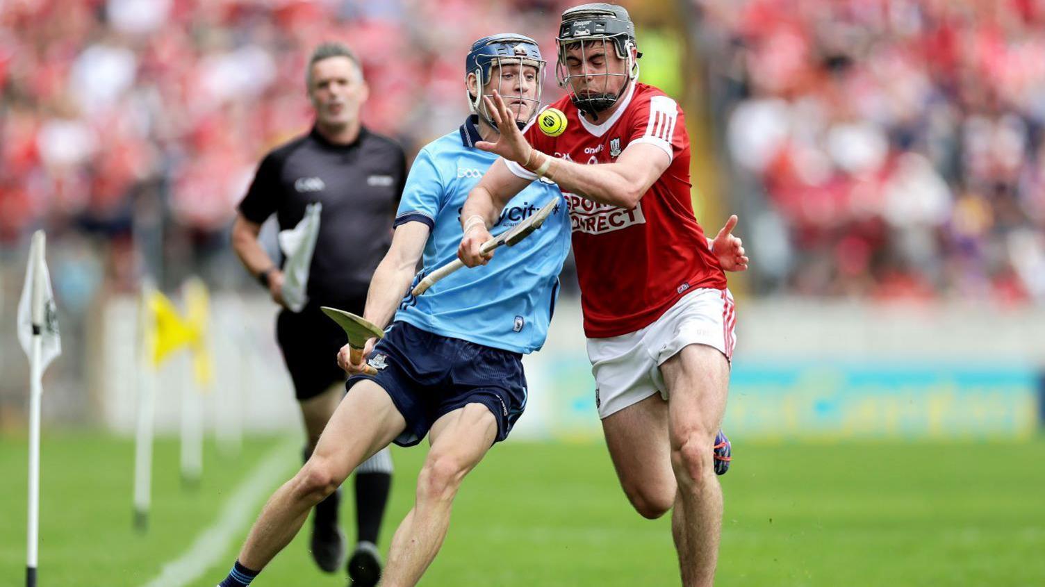 Dublin's Brian Hayes and Cork's Darragh Fitzgibbon in action