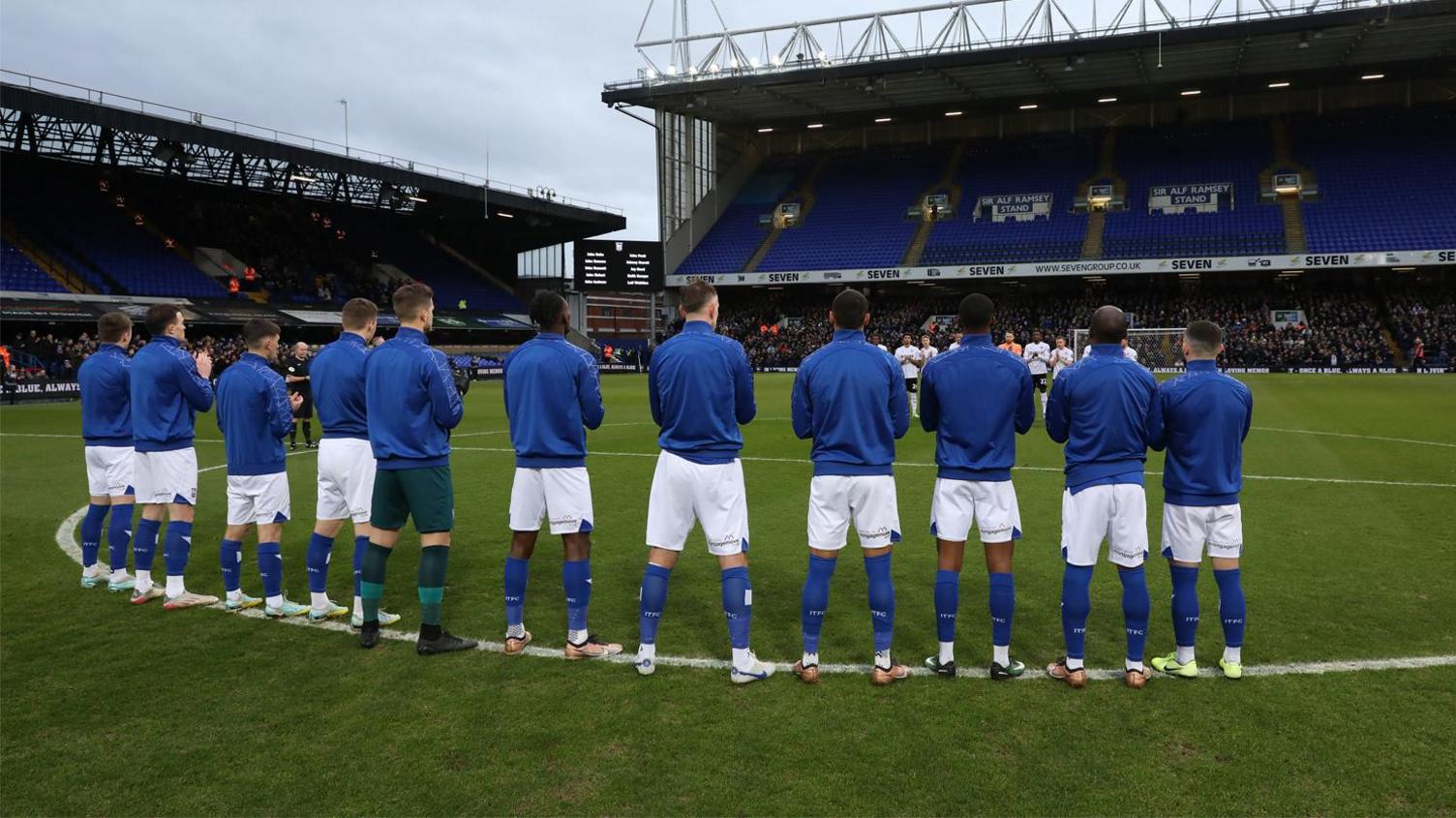 Players on the pitch at Ipswich Town Football Club 