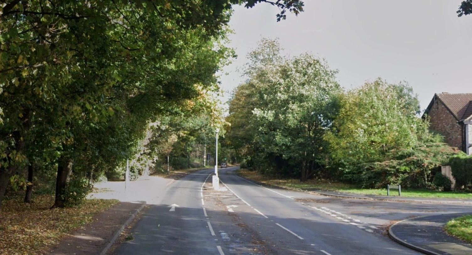 Redbourn Road, in Hemel Hempstead, showing a road with a junction and trees surrounding it