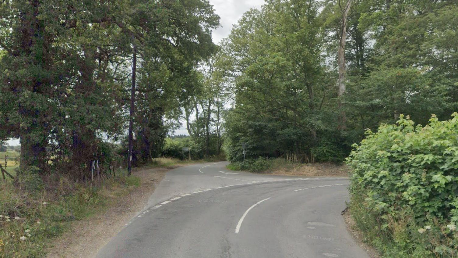 The junction of Ship Hill and Littleworth Road, between Burnham and Beaconsfield in Buckinghamshire. It is a two-lane country road and is surrounded by hedges and trees.