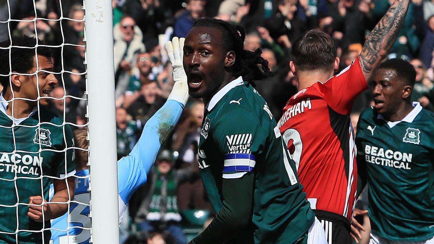 Malachi Boateng celebrates his goal for Plymouth Argyle against Exeter City