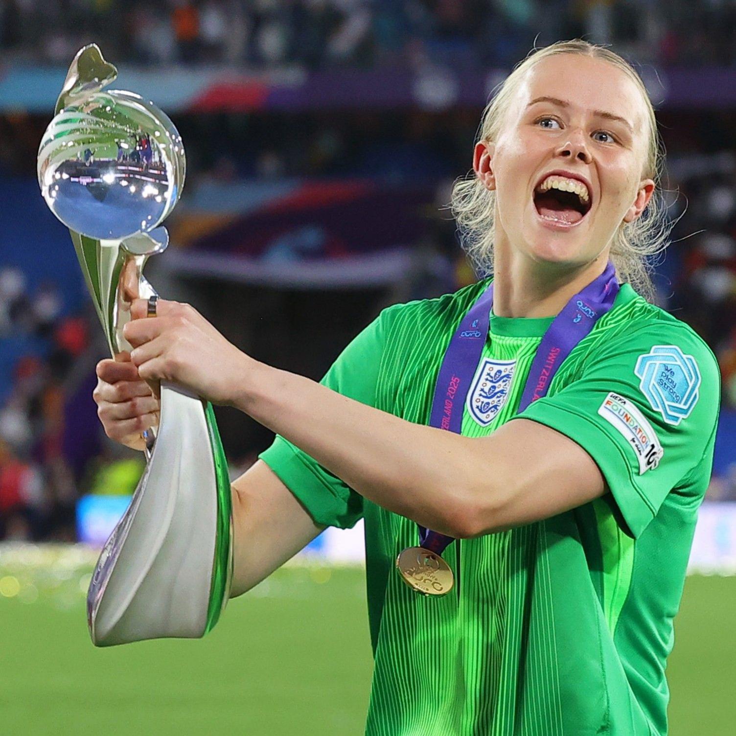 Hannah Hampton holds the trophy after England's Euro 2025 victory