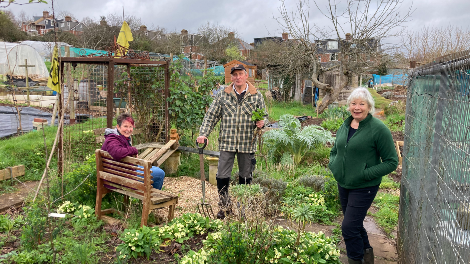 three people together in allotments