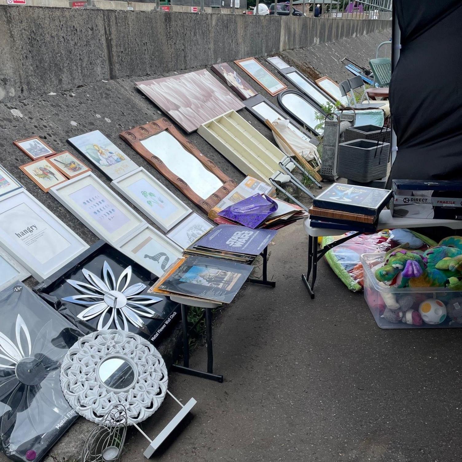 Items lined up for sale at a tip